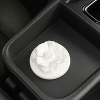 Nouvelle pierre d'arôme de fleur en céramique suspendue pierre de plâtre parfumée huile essentielle naturelle pour la décoration intérieure de voiture et le tiroir et les vêtements