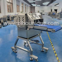 Machine à découper et à trancher la viande de porc, de bœuf et de poulet en bandes de largeur variable, pour la préparation de tranches de poitrine de poulet