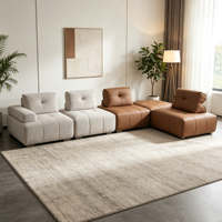 Canapé modulable carré en cuir et lin respirant, design moderne et confortable pour la détente familiale et l'accueil des invités