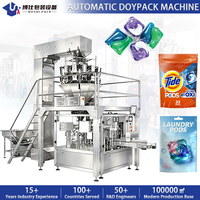 Machine d'emballage automatique pour sachets préformés de lessive en dosettes, de détergent et de capsules pour lave-vaisselle, avec fonction de comptage et de pesage, pour sachets à fermeture éclair
