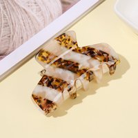 Barrettes à cheveux rayées de style européen et américain YuAo pour la vente en gros. Pinces à cheveux pour queue de cheval haute. Attache pour chignon rétro.
