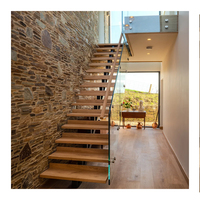 Escalier intérieur durable à monopoutre flottante, design moderne, avec garde-corps en verre, escalier en acier et bois pour appartements, sous-sols, halls