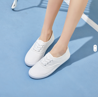 Chaussures de mode en toile légères très vendues avec logo personnalisé, chaussures de sport/chaussures en toile blanches en gros en Chine.