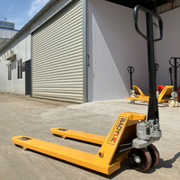 SYNGE Hot Selling 2Ton Hand Pallet Truck dengan Ketinggian Garpu 80mm untuk Penggunaan Dalam Ruangan Garansi 1 Tahun-Pompa Hidrolik untuk Mesin Pengangkat