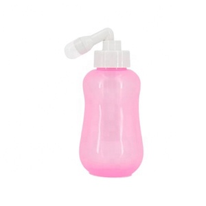Bouteille de lavage péri-rectal NZMAN rose translucide à l'envers pour soins post-partum, bidet portable pour nettoyage et récupération périnéale pour les nouvelles mamans - Product Image 1