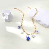 Collier en chaîne avec pendentif en forme de cœur en imitation perle céramique, design unique, accessoire de style luxe léger