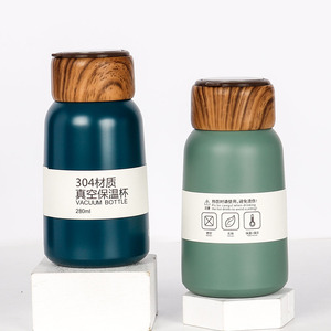 Nuovo prodotto ecologico fiaschetta in legno da 280ml con coperchio bottiglia d'acqua in acciaio inossidabile con manico in Silicone - Product Image 1