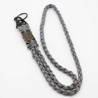 Porte-clés en paracorde tressé OEM avec drapeau américain, collier en corde de parachute, porte-clés en paracorde tressé résistant