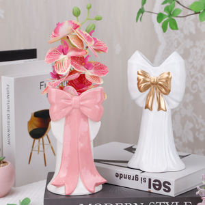 Redeco elegante <span class=keywords><strong>vaso</strong></span> <span class=keywords><strong>in</strong></span> ceramica <span class=keywords><strong>bianca</strong></span> con fiocco <span class=keywords><strong>rosa</strong></span> dorato Design decorazione per la casa <span class=keywords><strong>vaso</strong></span> <span class=keywords><strong>in</strong></span> ceramica per soggiorno camera da letto centrotavola - Product Image 1