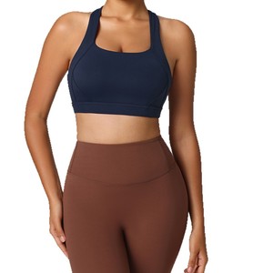 Haut de yoga pour femme, sans coutures, couleurs unies, bretelles croisées, coupe courte, séchage rapide, respirant, soutien-gorge de sport - Product Image 1