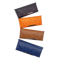 Étui à lunettes en cuir artisanal de haute qualité avec logo personnalisé, apparence élégante, fonction de protection, impression de texte