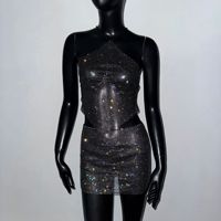 Ensemble 2 pièces sexy pour femme en résille orné de strass : Crop top licou et mini-jupe scintillante pour soirées, festivals et clubs