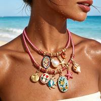 Collier double couche en cordon tressé rose avec pendentif coquillage, étoile de mer et perle peinte, style bohème, fait main pour femme