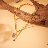 Collier Manafactuar Logo personnalisé Non ternissant Étanche Acier inoxydable Plaqué or 18 carats Collier Hamsa pour femmes