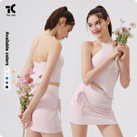 Ensemble de sport sexy à dos ouvert avec coussinets de poitrine fixes, débardeur de fitness, short taille haute deux pièces uni et jupe de badminton, tennis, yoga