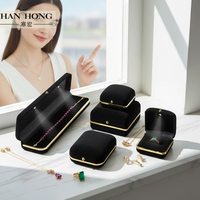 Vente en gros d'usine de parure de bijoux collier boîte à bagues emballage de bijoux boîte à bijoux personnalisée en velours noir lumière LED avec logo