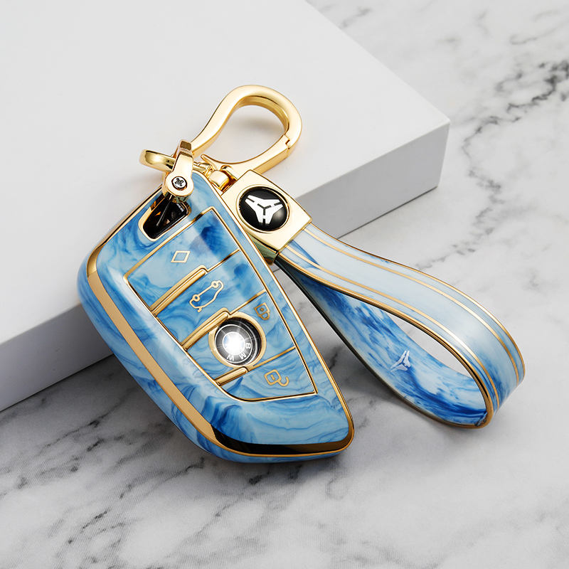 Cache bouton 4 bleu + porte-clés TPU