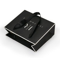 Sacs shopping en papier noir personnalisés avec poignée en ruban, logo imprimé, sac fourre-tout de luxe pour boutique, sac cadeau pour la vente de vêtements