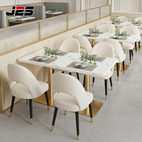 Ensemble table et chaises de restaurant J2S en marbre moderne avec base métallique pour café, projets de restauration commerciale écologiques