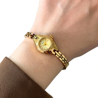 Reloj de Cuarzo de Moda para Mujer con Esfera Redonda Pequeña de Aleación, Correa de Hebilla Integrada y Esfera de 17 mm