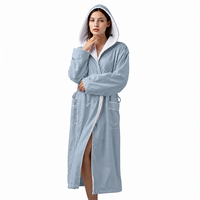 Nouveau peignoir à capuche en polyester tricoté double face, doux pour la peau, durable, idéal pour les vacances et la maison, unisexe