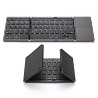 Mini clavier BT pliant chaud Mini clavier pliable BT pour PC Touchpad clavier pliant sans fil Portable
