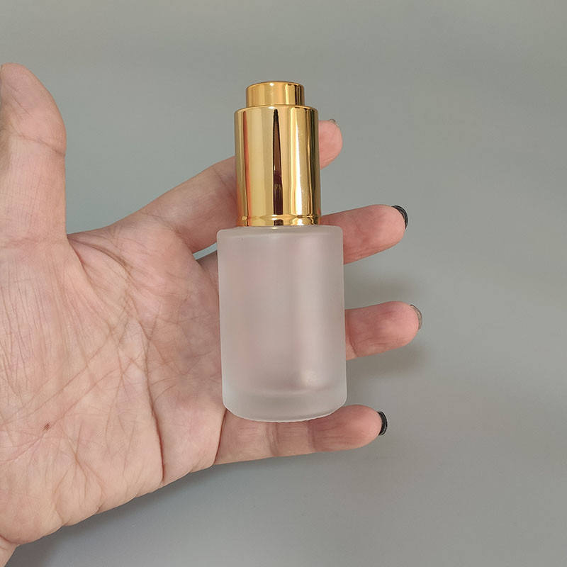 ขวดฝ้าด้วยด้านบนสีทอง