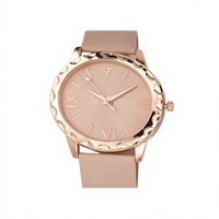 Montre-bracelet pour femme minimaliste plaquée or rose, cadran rond à index mixtes, lunette à bord concave, fabrication sur mesure en usine