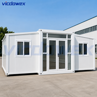 VICDOWEX Maison conteneur extensible à double aile avec 2 chambres, salle de bain et cuisine pour hébergement et bureau