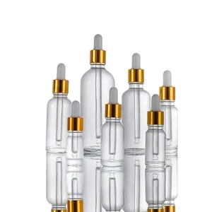 OEM ODM 5ml 10ml 15ml 20ml 30ml 50ml 100ml स्पष्ट आवश्यक तेल की बोतल ढक्कन और डाट के साथ ड्रॉपर कांच की बोतल