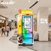 Distributeur automatique Haloo 24h/24 de yaourts et glaces molles avec système de paiement par pièces, code QR et jetons