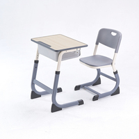 Ensemble de bureau et chaise d'école réglables pour étudiants en plastique moderne avec cadre métallique écologique, design ergonomique, empilable et durable