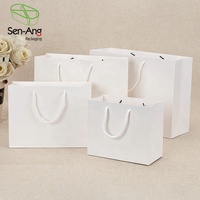 SenAng03 Chine Vente en gros sac en papier artisanal promotionnel plat imprimé personnalisé avec poignée