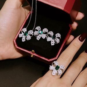 Dylam Stylish 925 Sterling Silver Rhodium Plated Rectangle <b>Emerald</b> Green 5A Cubic Zirconia Bow Knot Pendant <b>Necklace</b> for Women - Product Image 3
