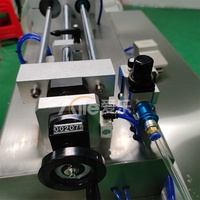 Machine de remplissage de liquides semi-automatique à buse unique pneumatique de haute qualité pour les produits cosmétiques, les parfums, les boissons et les huiles