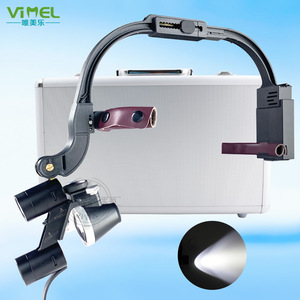 Lámpara frontal LED Vimel Dental con lupa 2.5X 3.5X recargable, binocular quirúrgica para uso odontológico - Product Image 1
