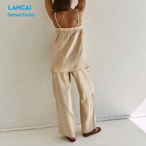 Fabricant de vêtements sur mesure Ensemble deux pièces Top asymétrique beige élégant et robe longue fluide pour femmes - Product Image 4