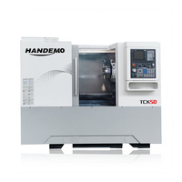 Tour CNC TCK50 avec robot portique à chargement automatique pour la production en série