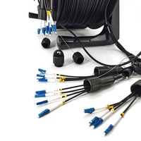 Câble de raccordement à fibre optique blindé tactique SM MM OM3 OM4 LC TPU sur bobine, certifié ISO9001, garantie 3 ans