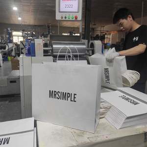 KM Custom Kraft Paper Grocery Shopping Tote Bag with logo Promotional Blank Clothes Packaging and Paper <b>Gift</b> Bags - Product Image 4