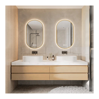 Ensemble complet de meubles de salle de bain en panneaux de particules : meuble sous-vasque, baignoire, toilettes