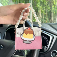 Nouveauté 2026 : Mini porte-sacs de luxe, ornements, porte-monnaie mignon, porte-clés, étui pour écouteurs pour femmes, porte-clés zéro