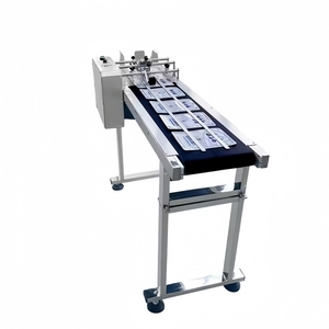 Codificador de impresora de fecha completamente automático de alta velocidad Máquina de paginación de alimentador usado con transportador - Product Image 1