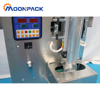 Machine d'emballage verticale automatique Moonpack VFFSG-100g pour granulés, avec scellage arrière, pour granulés de charbon actif