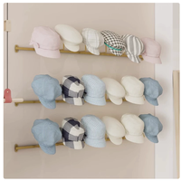 Moderno Organizador de Sombreros de Hierro Resistente para Montar en la Pared con 9 Ganchos, Diseño Multifuncional y Elegante para Almacenamiento de Sombreros