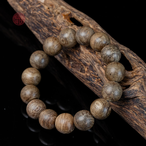 Pulsera Redonda de Madera de Oud de Malasia, Cuentas Lisas de 14 mm con Infusión de Aceite Maduro, Joyería Natural Elegante - Product Image 1