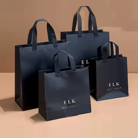 Sac en papier de luxe imprimé personnalisé logo de marque cadeau shopping bijoux vêtements recyclables sacs de transport au détail