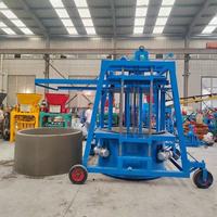 Machine multifonctionnelle pour la fabrication d'anneaux de puits en béton et de tuyaux de ciment