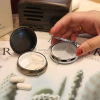 JIESMART Boîte à pilules portable en métal, étui de voyage classique rond brillant avec logo personnalisé, étui à capsules de médicaments vierge