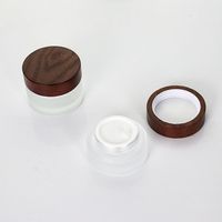 Ventas calientes Ash Tree Tapa de aerosol de madera Tapa de bambú Botellas de bomba de vidrio cosmético para cosméticos